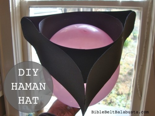 Construction paper Haman hat, modeled by balloon