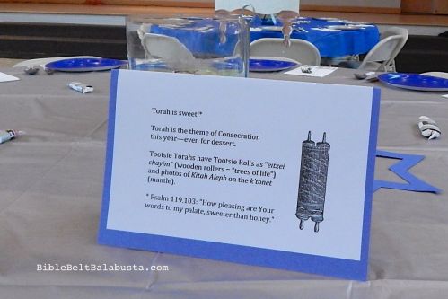 I made one of these per table, to explain the weird Tootsie things scattered about