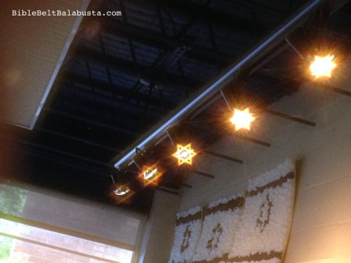 Classroom lights as viewed through glasses during daylight